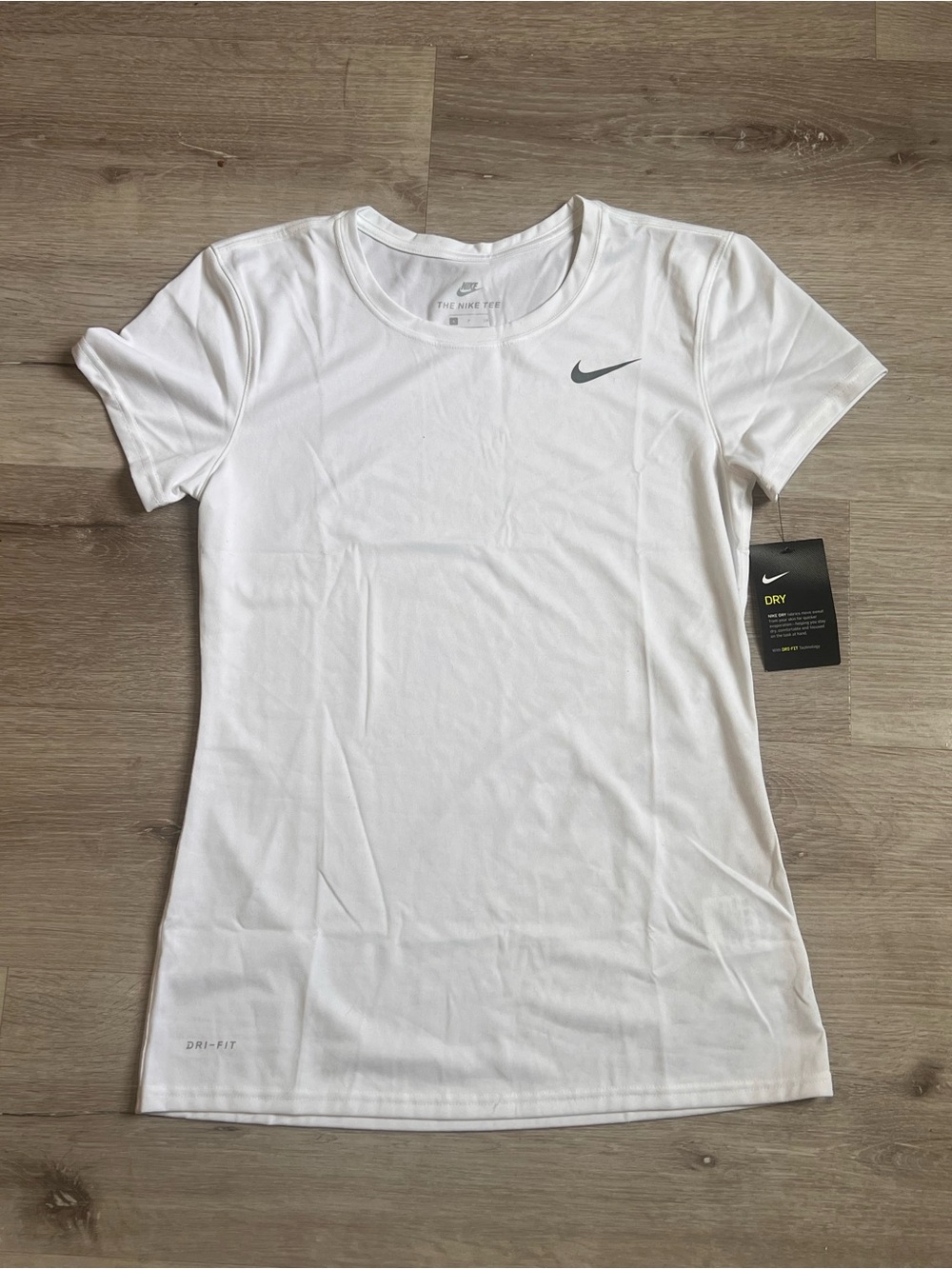 Nike Women’s White Short Sleeve Dri-FIT Tee with Gray Swoosh